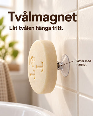 Savont tvålmagnet håller en tvål hängande på badrumsväggen, med texten Låt tvålen hänga fritt