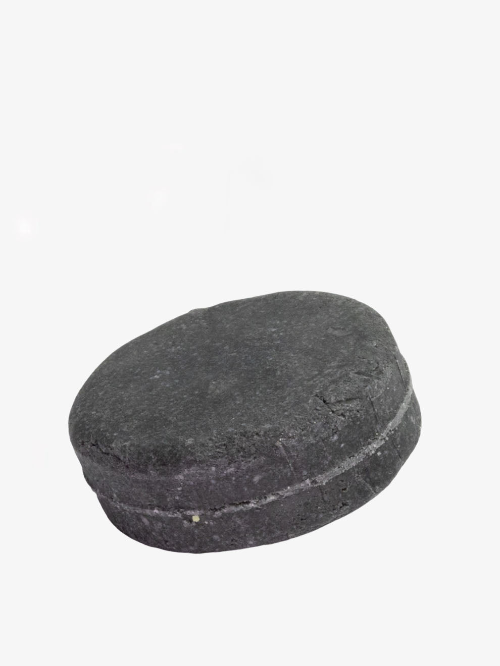 Grön Lycka schampokaka Black Fairy detox i vit förpackning