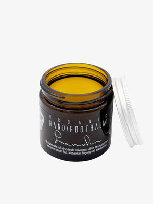Öppen burk med Kaliflower hand- och fotkräm med lanolin