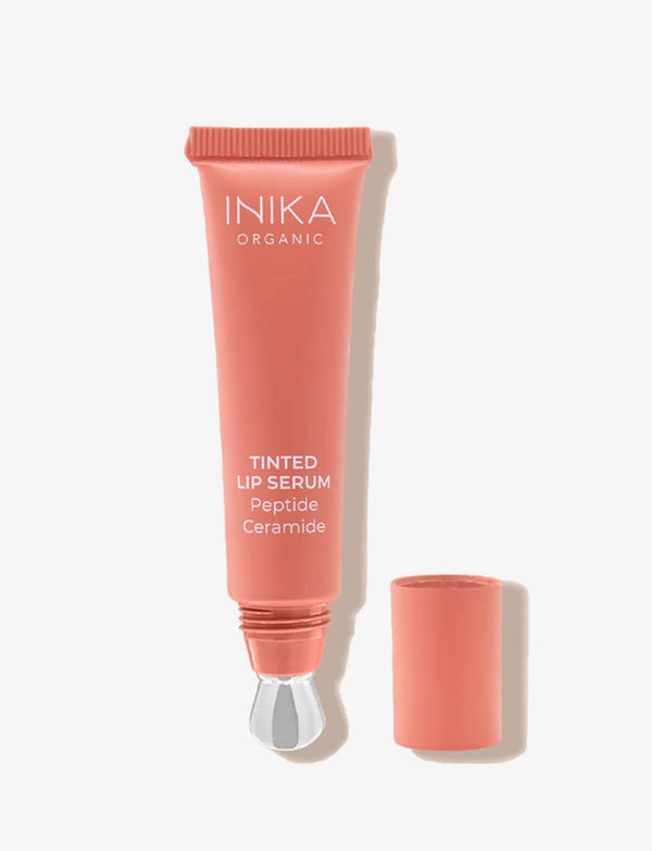 INIKA Tinted Lip Serum i korallrosa tub med lock bredvid